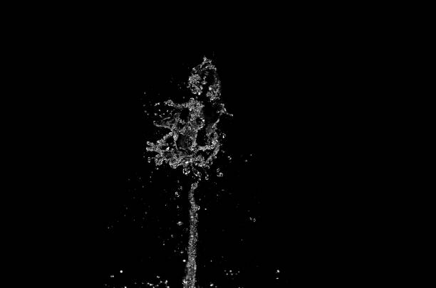 istock water splash, waterfall isolated on the black background 1372078840