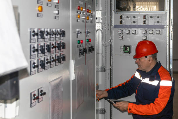istock An electrical engineer inspects the control panels controlling the electrical system in the control room. 1372083015