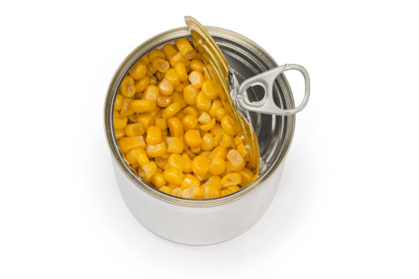 istock Canned sweet corn in open round tin can, top view 1372086413