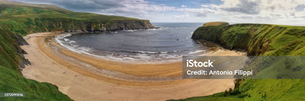 View of the Atlantic coast in the Northern Ireland during the summer Beach Stock Photo