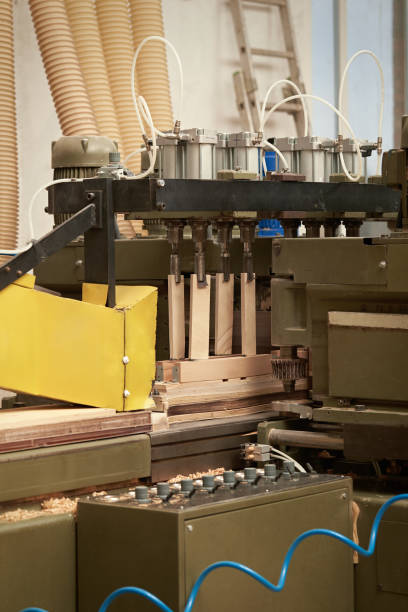 istock Vertical closeup fragment of a woodworking machine. 1372094302