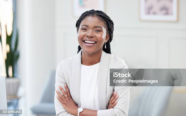 Shot Of A Young Businesswoman Taking A Break In Her Office Stock Photo - Download Image Now