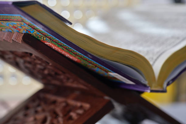 istock close up light on open holy bookk Koran 1372097163