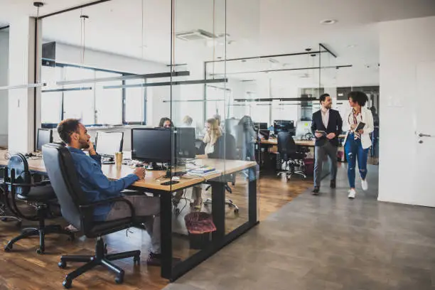 Photo of Group of business colleagues working in the office