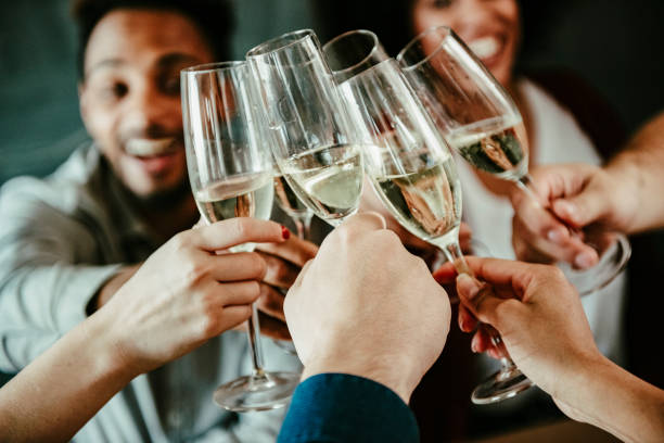 istock Young Happy Friends Toasting At Party 1372099450