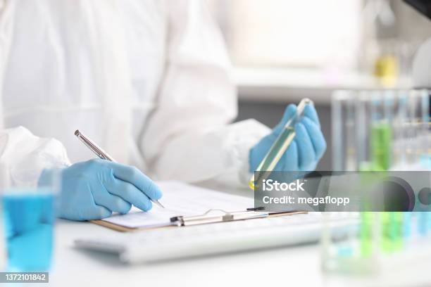 Study Of Fuel In Vitro By Scientist In Laboratory Stock Photo - Download Image Now - Laboratory, Examining, Scientific Experiment
