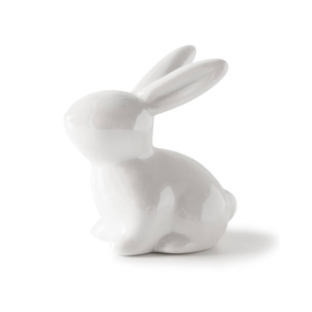 istock Easter white porcelain bunny isolated on white background. 1372102193