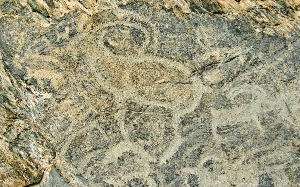 istock ancient pictures on a rock 1372102813