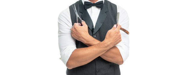 istock cropped man barber with razor blade and scissors in bow tie isolated on white background 1372104284