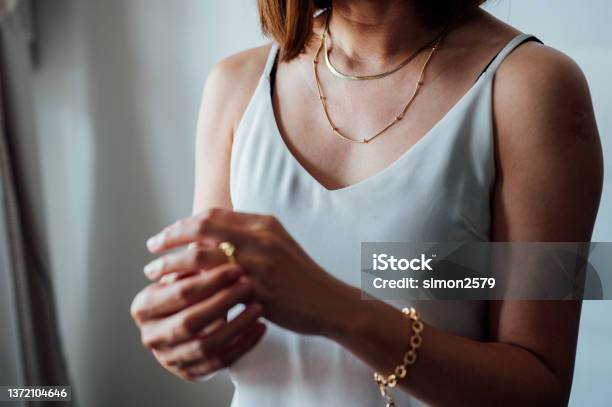 Portrait Of An Asian Woman With Jewelry Stock Photo - Download Image Now - Necklace, Gold - Metal, Gold Colored