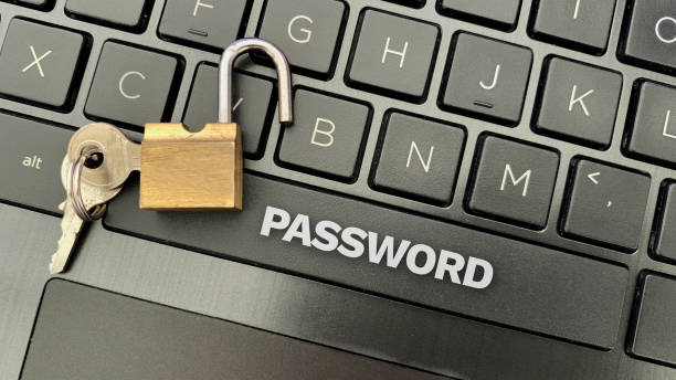 istock Top view of word - Password on laptop with padlock background. 1372104656