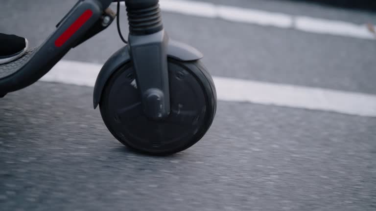 Close up electric scooter wheel on the move