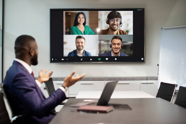istock Black businessman having video conference with multiracial team 1372113947