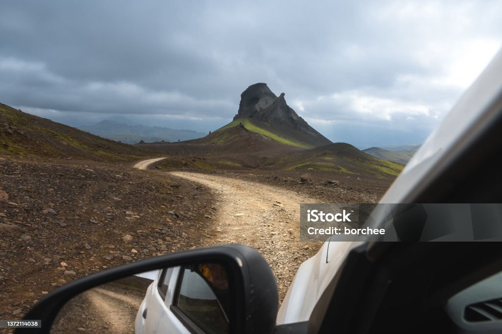 4x4 Driving in Iceland View from the car on a gravel road (F-road) leading through the volcanic landscape (south Iceland, near Thorsmork). Iceland Stock Photo