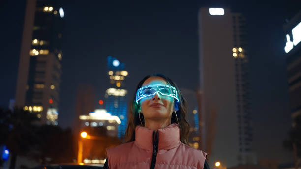 Young woman wearing augmented reality glasses Young woman wearing augmented reality glasses. smart glasses eyewear stock pictures, royalty-free photos & images