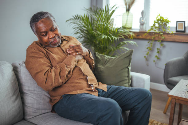istock Senior man who suffers, shrinks and has difficulty breathing 1372115337