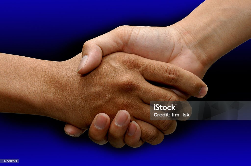 Corporate Deal business handshake over a bule background Abstract Stock Photo