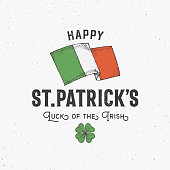 istock Vintage Style Saint Patricks Day Label Template. Hand Drawn Irish Flag and Shamrock Leaf Sketch Symbols with Retro Typography. Shabby Texture Background. 1372119311
