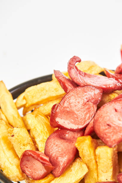 istock French fries with fried hot dogs 1372119747