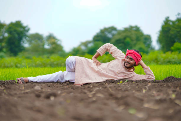 istock Indian farmer rest in agriculture field. 1372119857