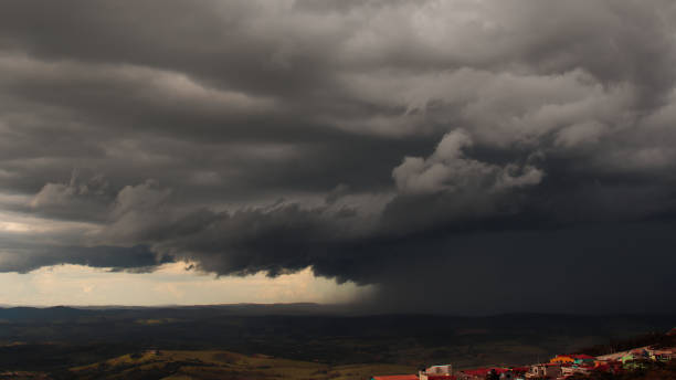 istock panoramic image of a dramatic sky with a large storm cloud that brings torrential rain to the Valley. 1372123574