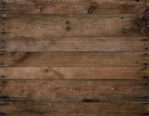 istock Wood texture. Weathered rustic wood background from aged old planks 1372124878