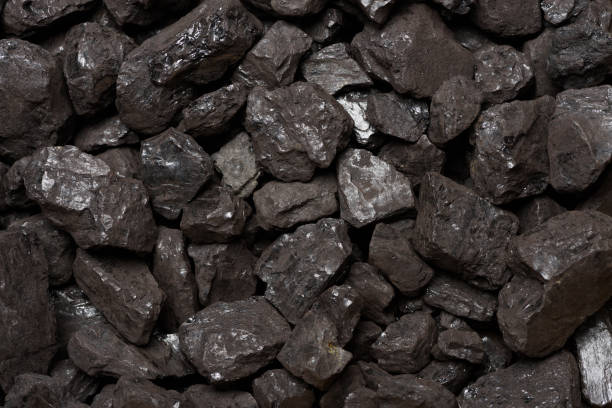 istock Natural coal texture top view. Black stone coal background 1372124886