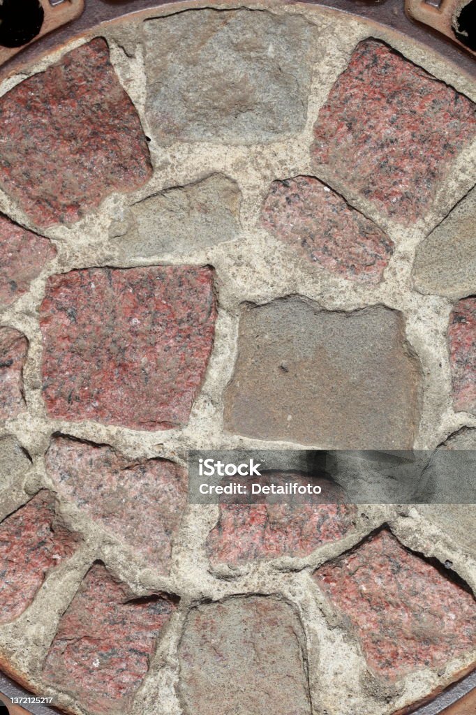 reddish and grey cobblestones in circular shape Beer Stein Stock Photo