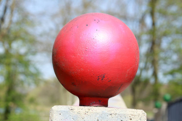istock Red stone ball on a bridge railing, Germany, Europe 1372125470