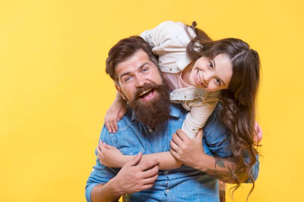 Father and happy little daughter having fun, lovely hug concept Father and happy little daughter having fun, lovely hug concept. fashionable dad stock pictures, royalty-free photos & images