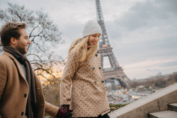 istock Smiling Couple walking up to a observation platform near Eiffel Tower, Paris 1372128303