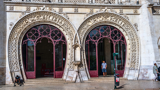 July 8, 2021.  Rossio Train Station, Baixa, Lisbon, Portugal.\n\nAt the time it was built, in the late 1880s, Rossio train station was Lisbon Central Station. Currently the service it provides is limited to trains running the Sintra region route.\nIts architecture is very beautiful and the entrance is characterized by two horseshoe-shaped doors.