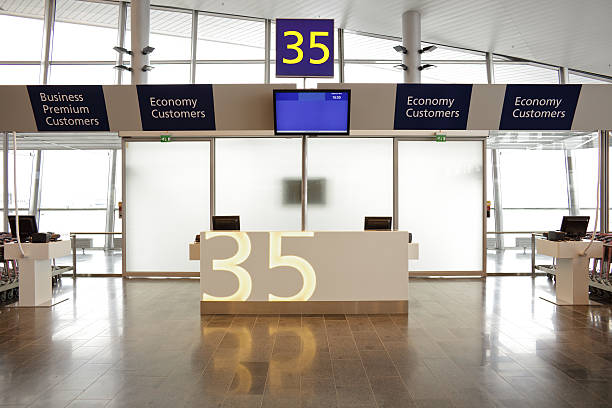 Empty Airport Terminal Gate Empty Airport Terminal Gate airport departure area stock pictures, royalty-free photos & images