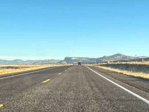 istock Long straight roads, New Mexico 1372132854