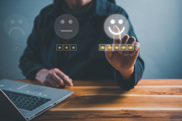 istock Customer Survey Feedback and Satisfaction Service Concept. Woman's Hands is Choosing Rate of Satisfaction Evaluation for Customers Service. Product Questionnaire for Customer Satisfied Feedback. 1372134462