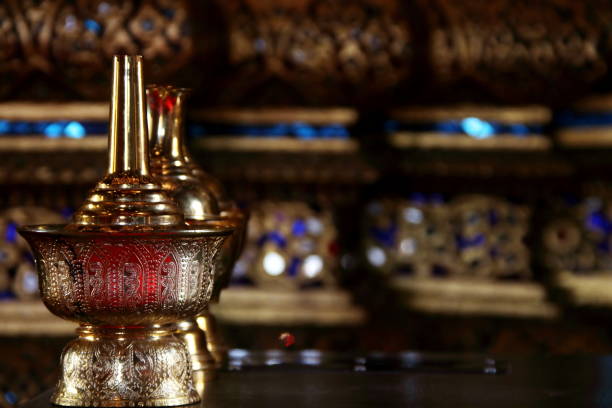 istock Thai style golden water container. 1372134661