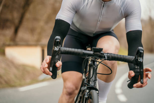 istock Cyclist preparing to brake during the race 1372135389