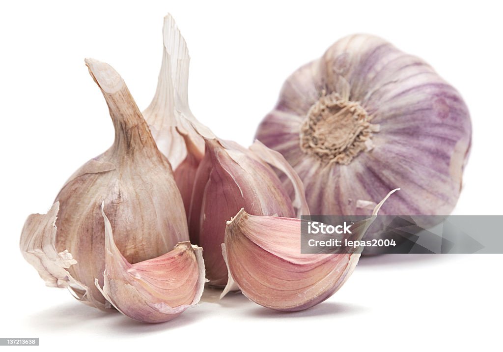 Garlic vegetable Garlic vegetable closeup isolated on white background Close-up Stock Photo