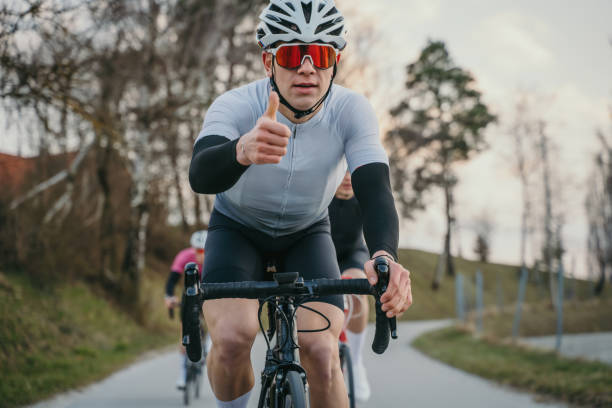 istock Cyclist showing thumbs up for a good ride 1372137246