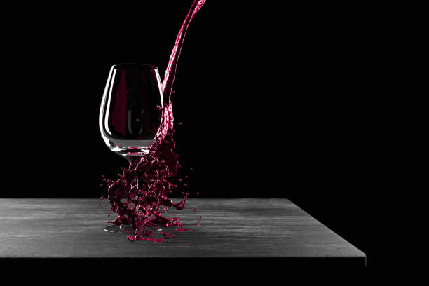 Spilled red wine Red wine spilled outside the wineglass by mistake, CGI and photography combined. wine glass knocked over stock pictures, royalty-free photos & images