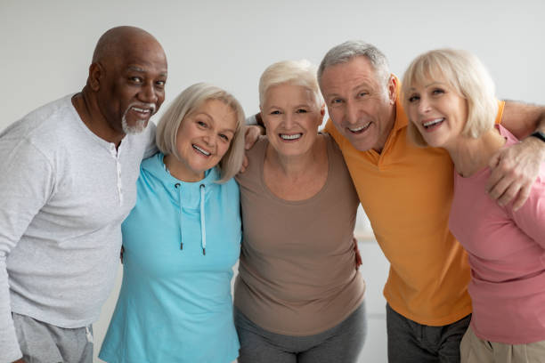 istock Multiracial group of athletic senior people posing together 1372138871