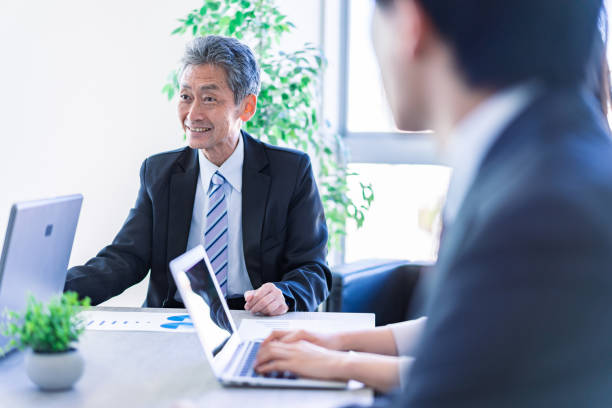 istock Senior manager speaking with a smile 1372141464