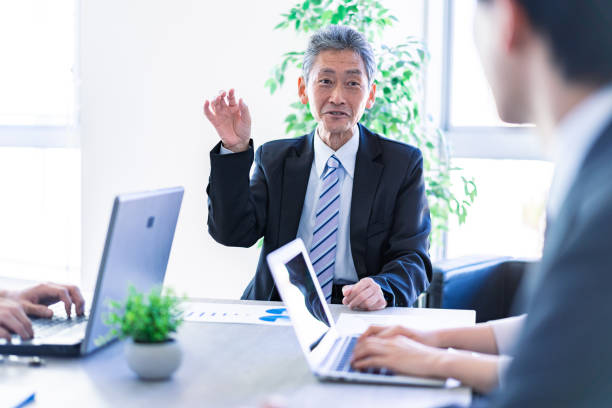 istock Senior manager speaking with a smile 1372141476