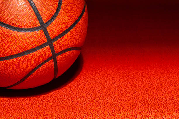 istock Basketball on a basketball texture background 1372144366