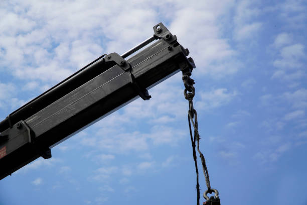 istock Crane boom with isolated hook, blue sky background,Elements of crane: hook, loop, chain, connecting parts 1372145888