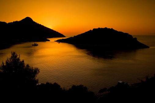 A beautiful sunset on Zaklopatica bay. Lastovo island in Croatia during summer.