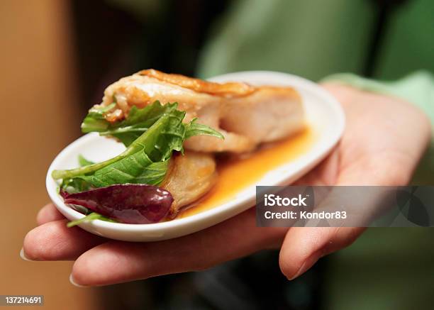 Woman Offering Snack Stock Photo - Download Image Now - Small, Meal, Serving Size