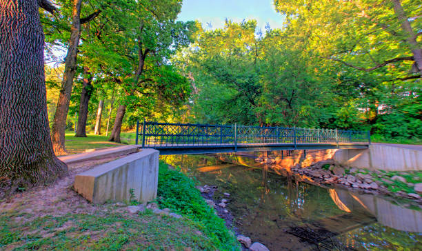 istock Iron Bridge on a walking path-Howard County, Indiana 1372147579