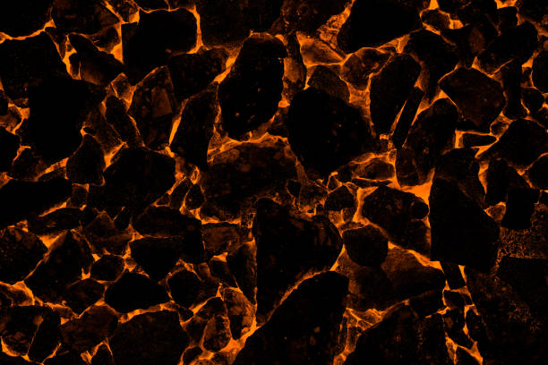 Close up top view of burning coals for texture background