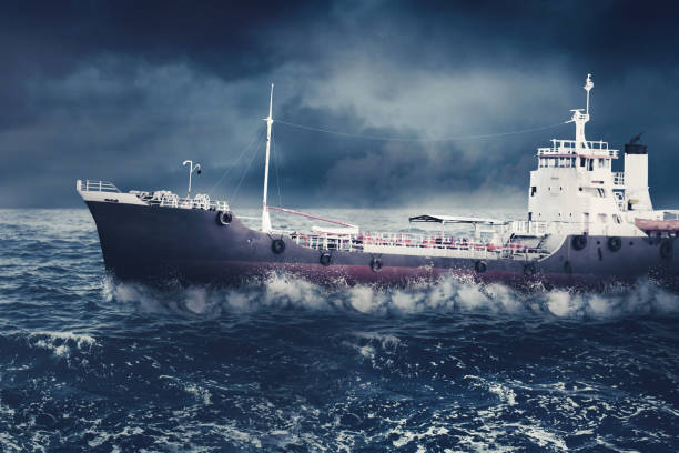 istock Cargo ship sailing on the storm sea 1372149891